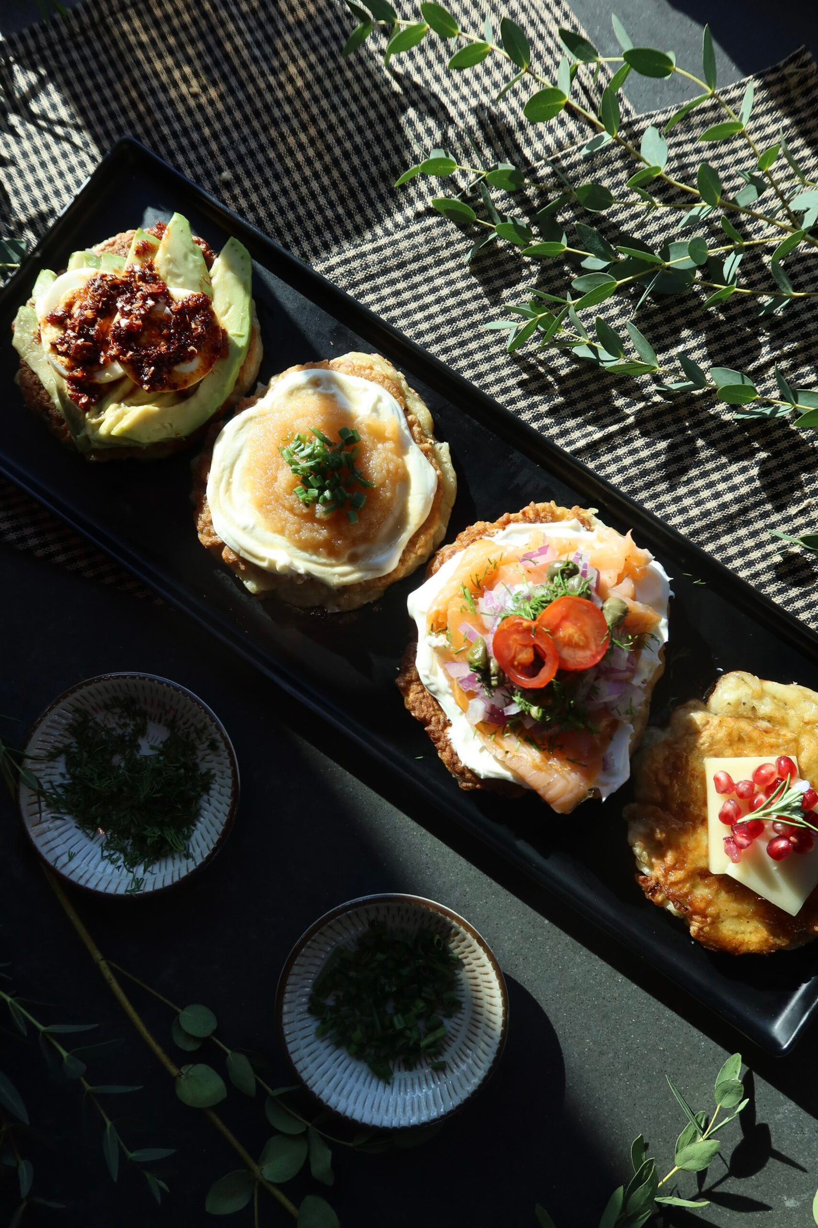 Crispy potato latkes sampler with lox classic breakfast and fromage toppings