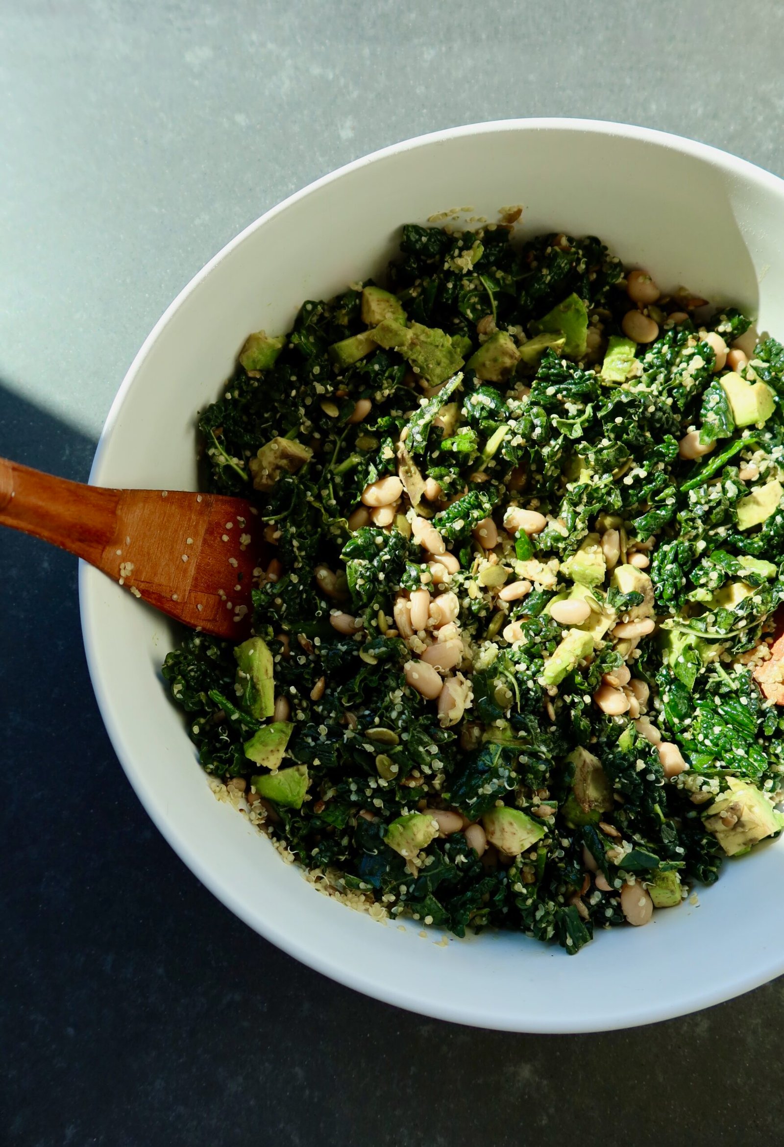 Erewhon white bean kale salad with quinoa seeds avocado and lemon maple dressing