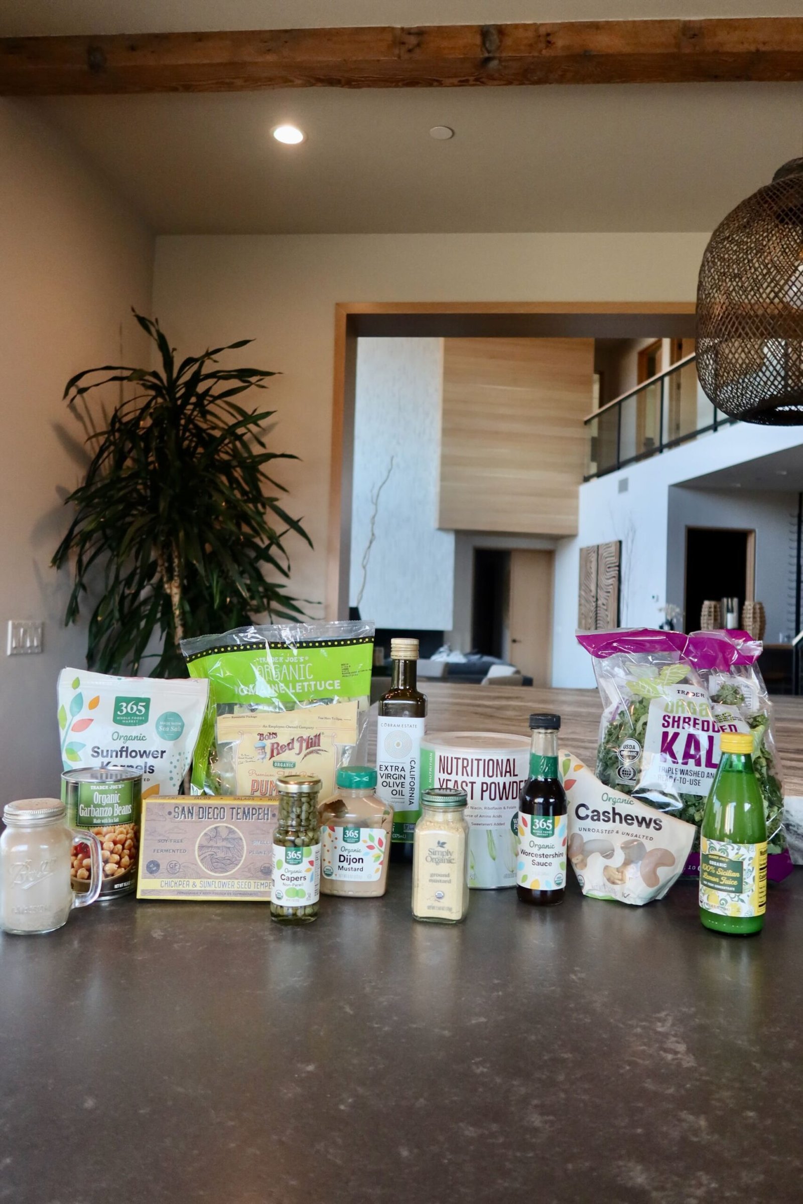 Ingredients for Erewhon vegan Caesar salad including romaine kale cashews chickpeas capers and nutritional yeast