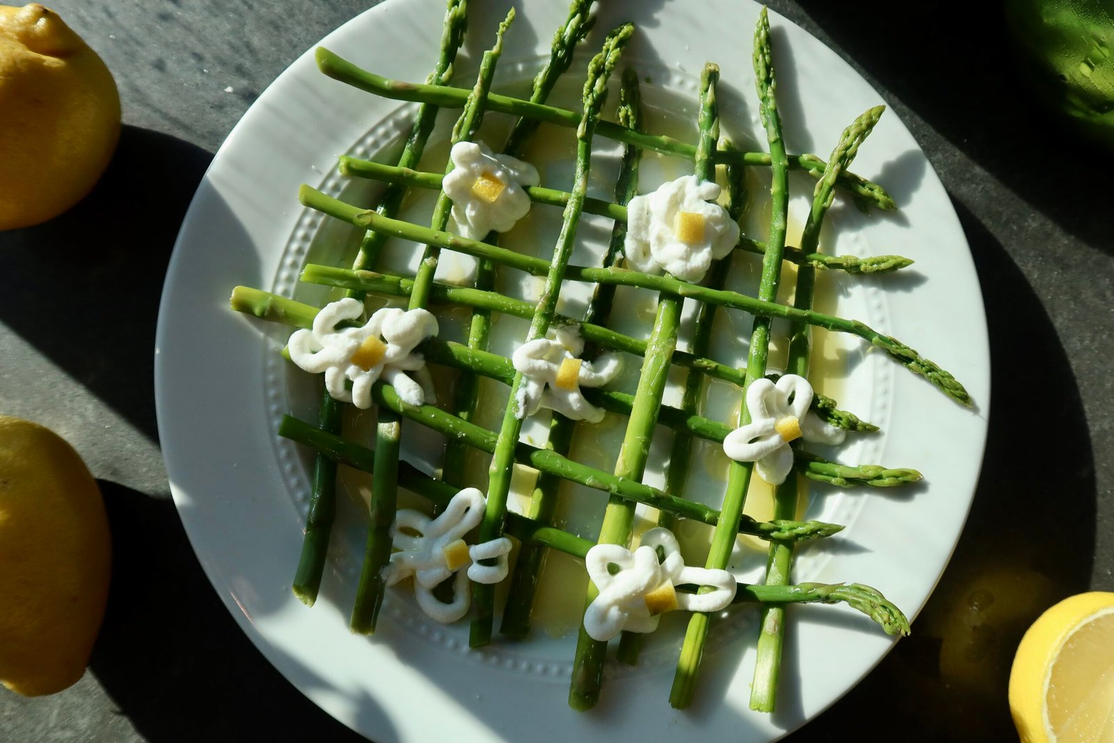 Spring asparagus garden plate with whipped yogurt ricotta flowers