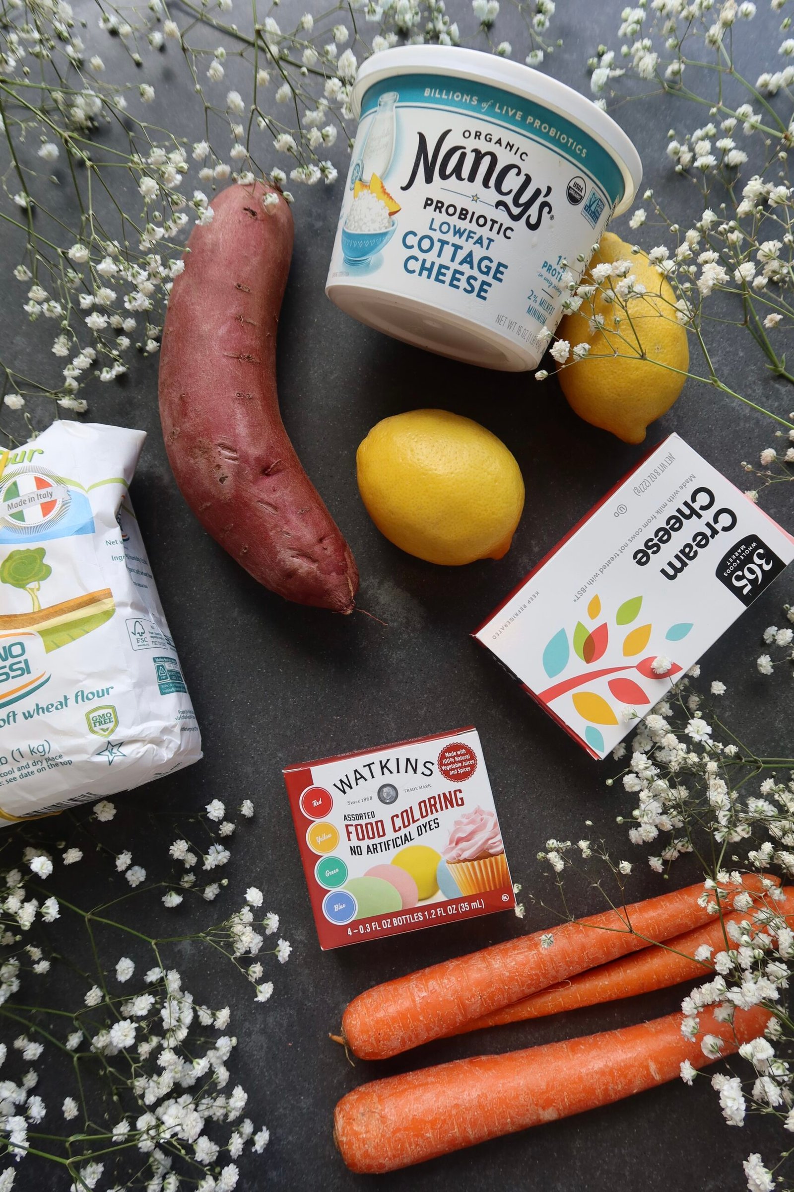 Ingredients for carrot ravioli with whipped sweet potato lemon filling including sweet potato carrot eggs and flour