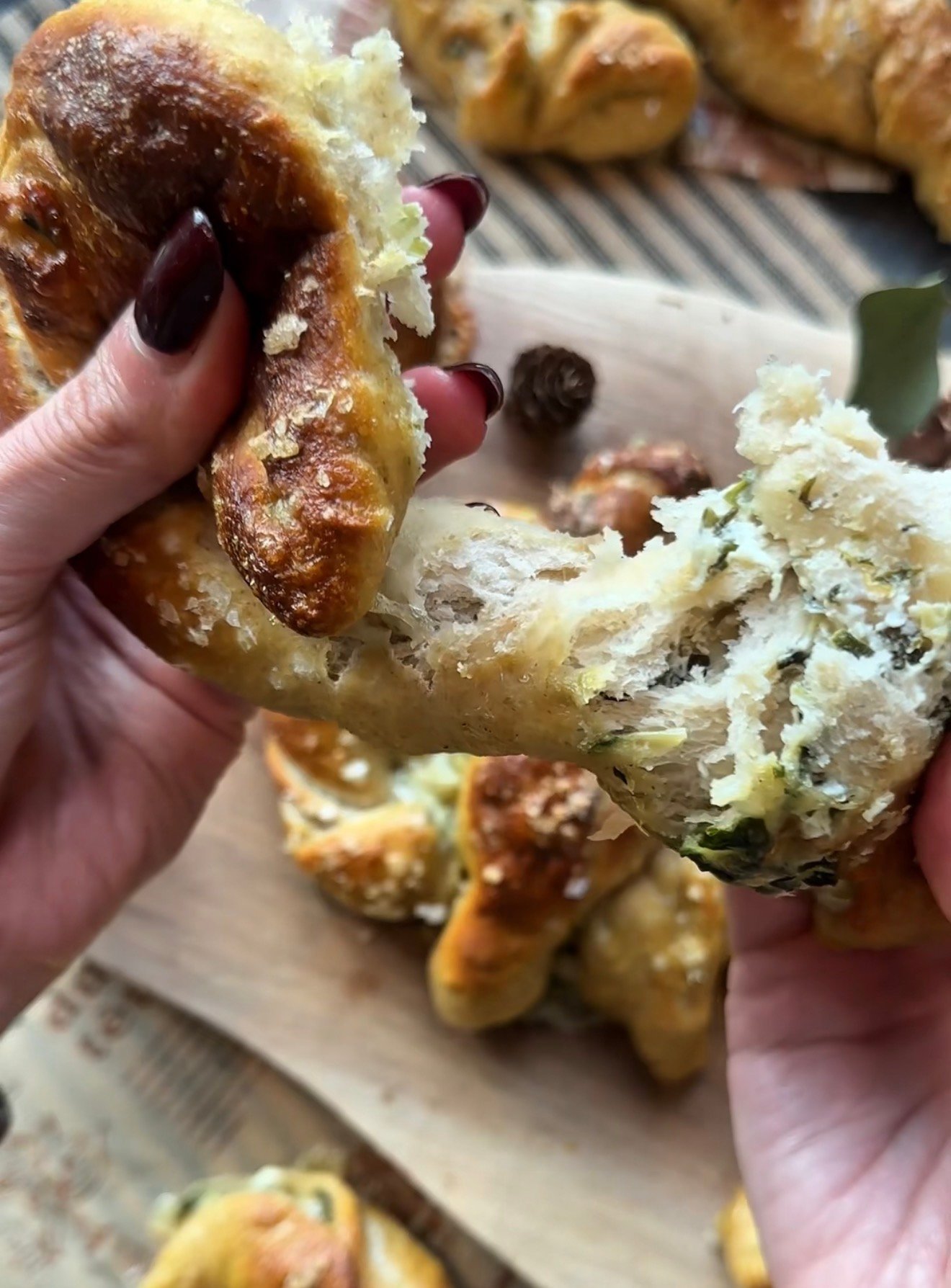 Creamy spinach artichoke filling with cream cheese mozzarella and marinated artichokes for stuffed pretzels