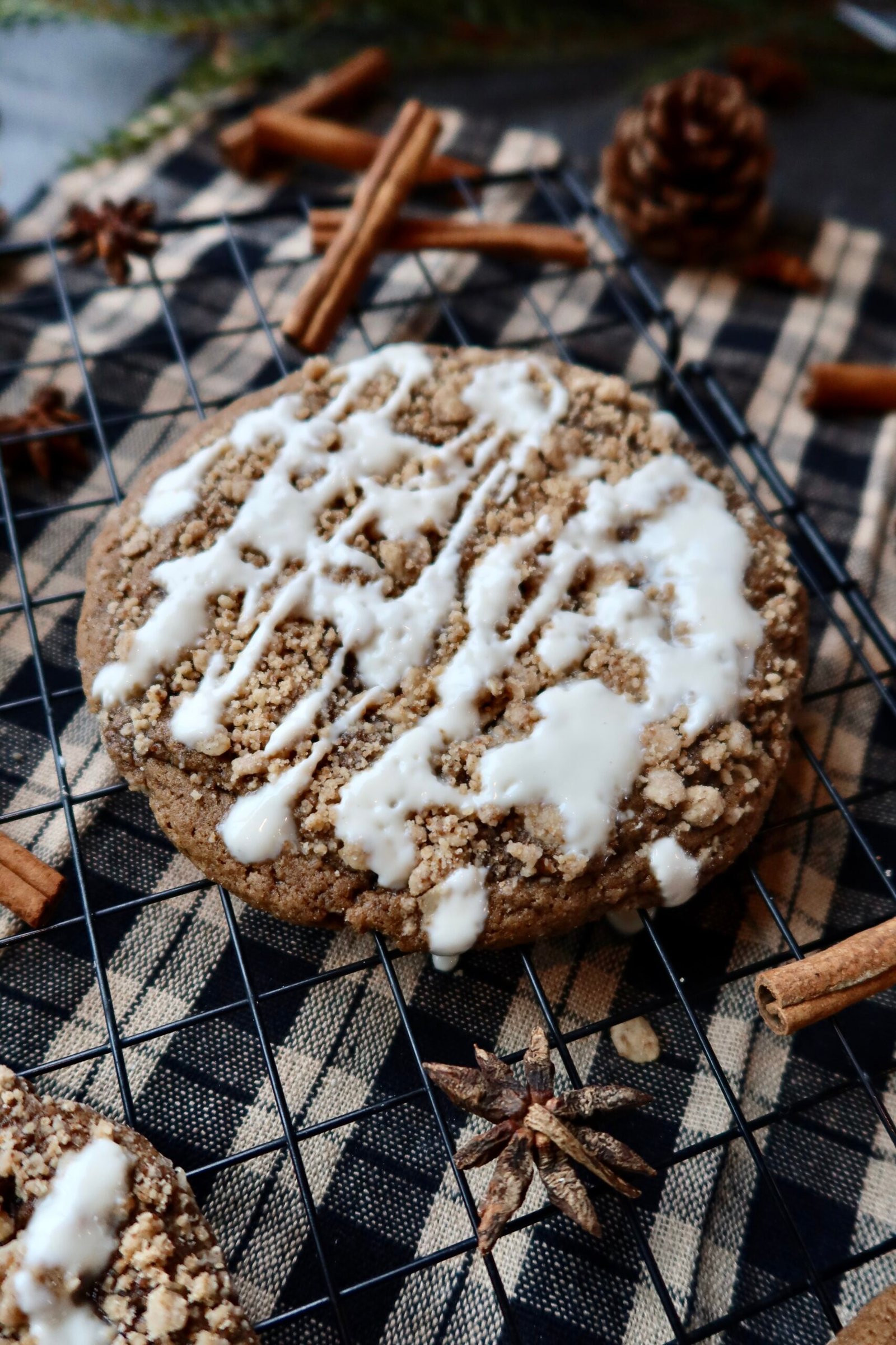 Close up of healthy coffee cake chai latte cookie showing oat streusel and maple yogurt glaze