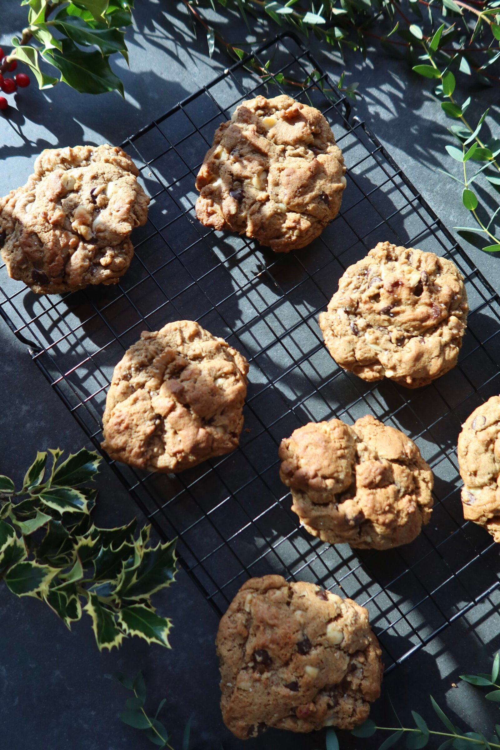 Thick brown butter chai levain cookies with chai glaze crisp edges and gooey centers
