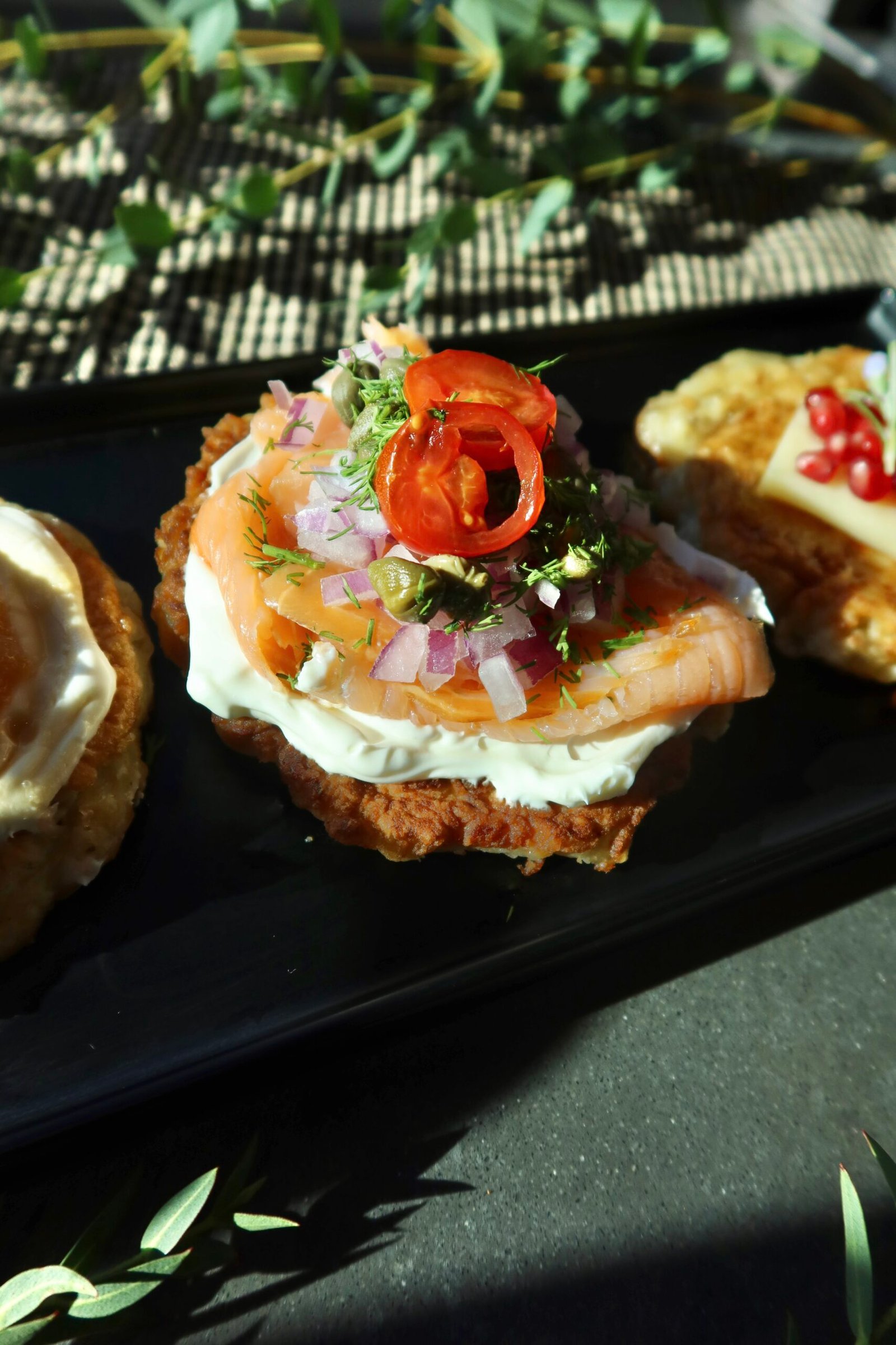 Crispy potato latkes sampler with lox classic breakfast and fromage toppings