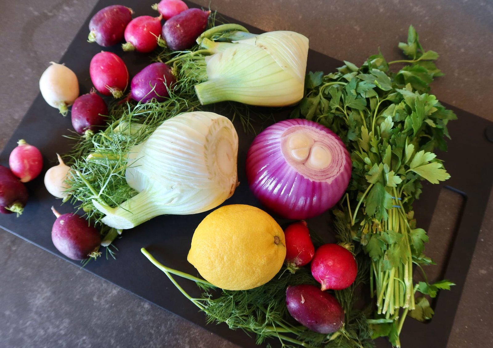 Step of making bright spring salad with roasted fennel and citrus vinaigrette
