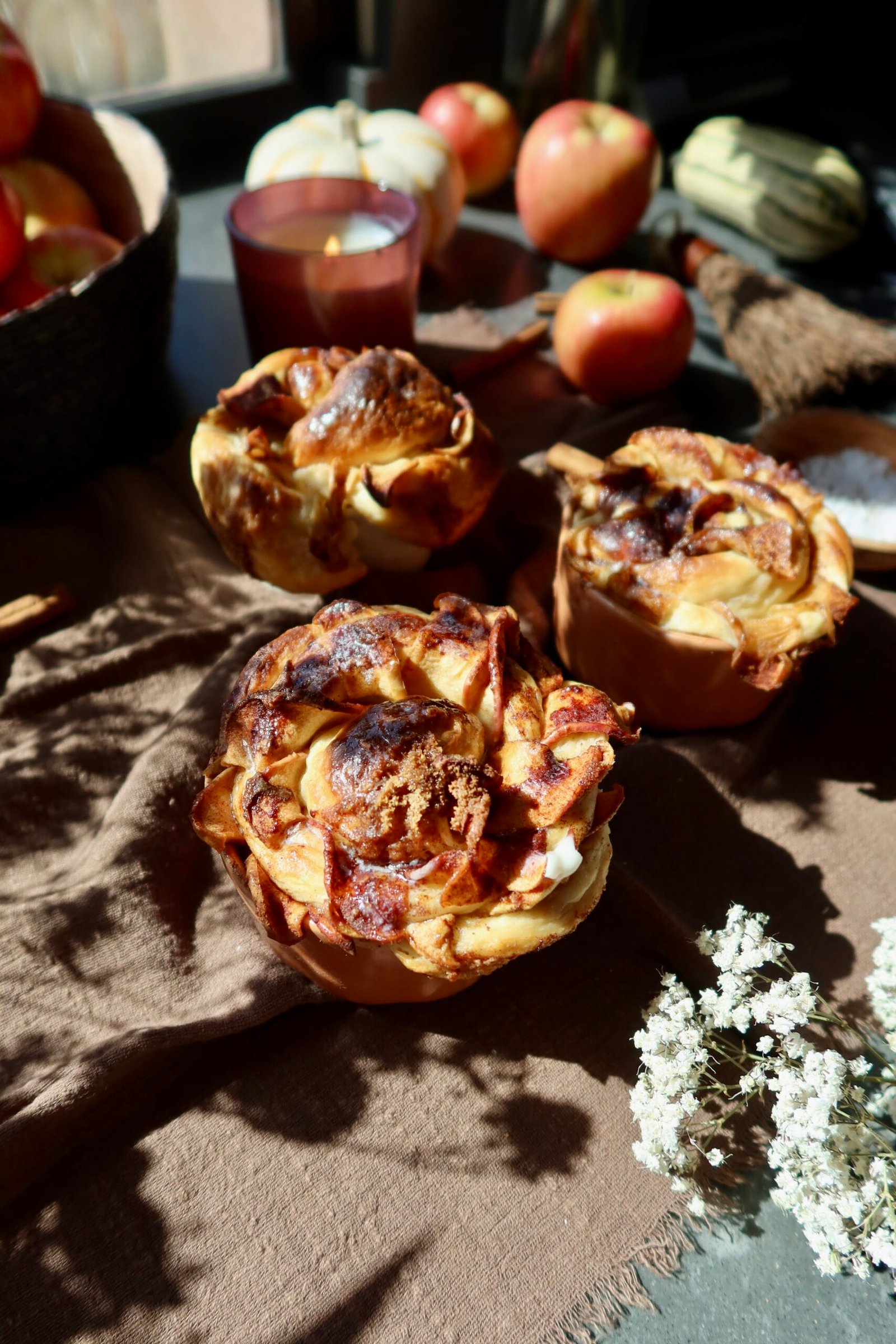Apple cider cinnamon roll roses with Honeycrisp apples and vanilla glaze