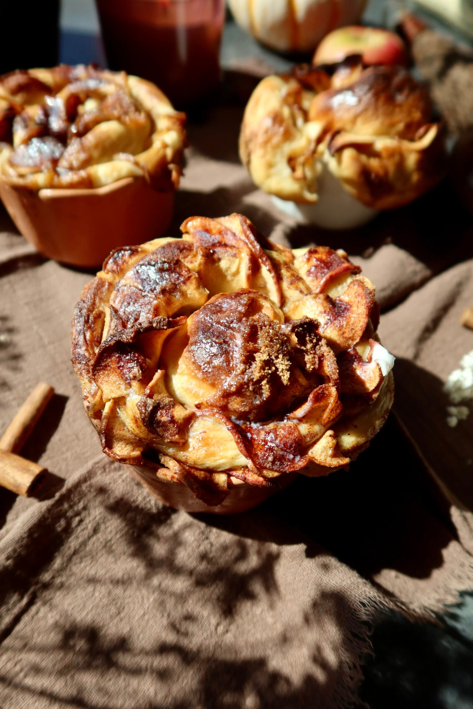 Apple cider cinnamon roll roses with Honeycrisp apples and vanilla glaze