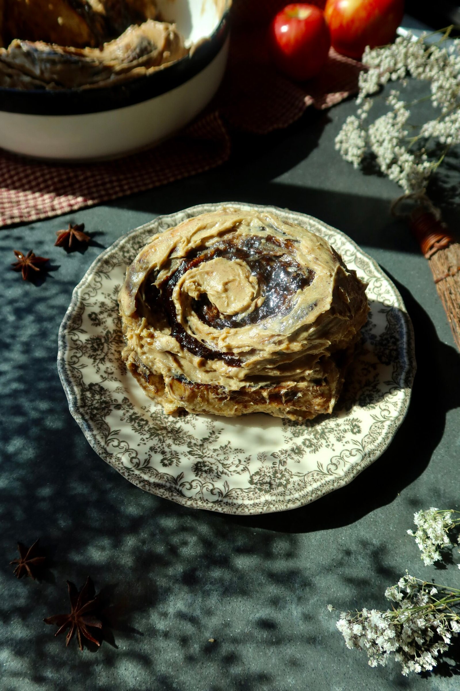 Giant brown butter apple cider cinnamon rolls with gooey apple butter filling and thick cream cheese frosting.