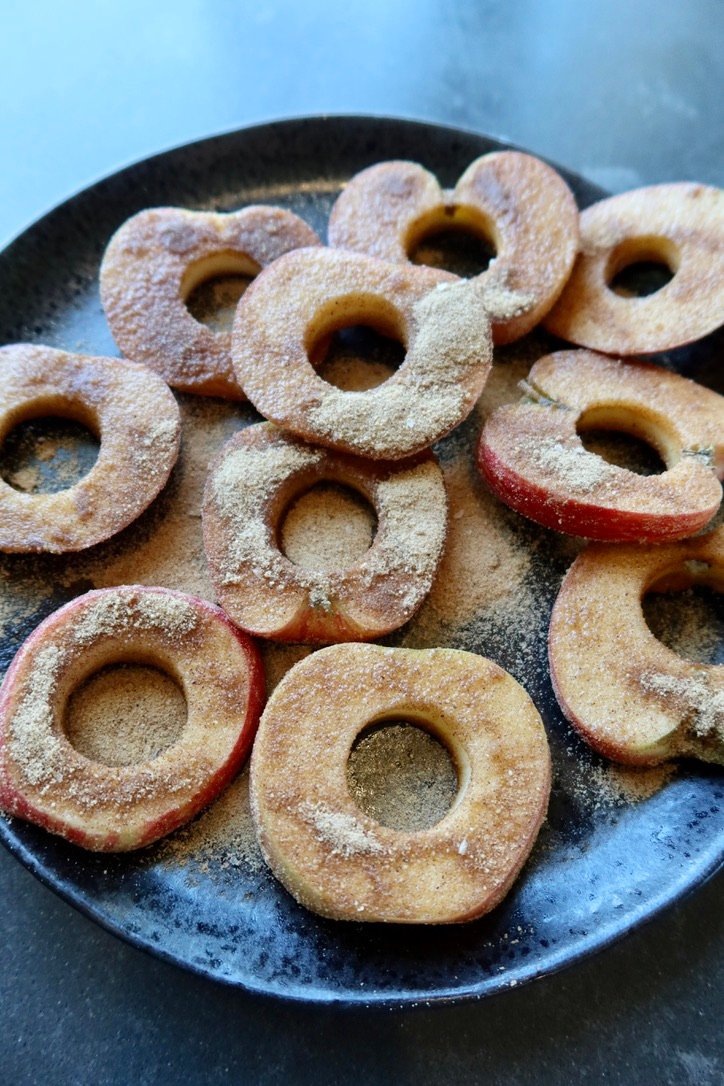 Easy puff pastry apple donuts with cinnamon apples, brown butter pecans and maple vanilla glaze