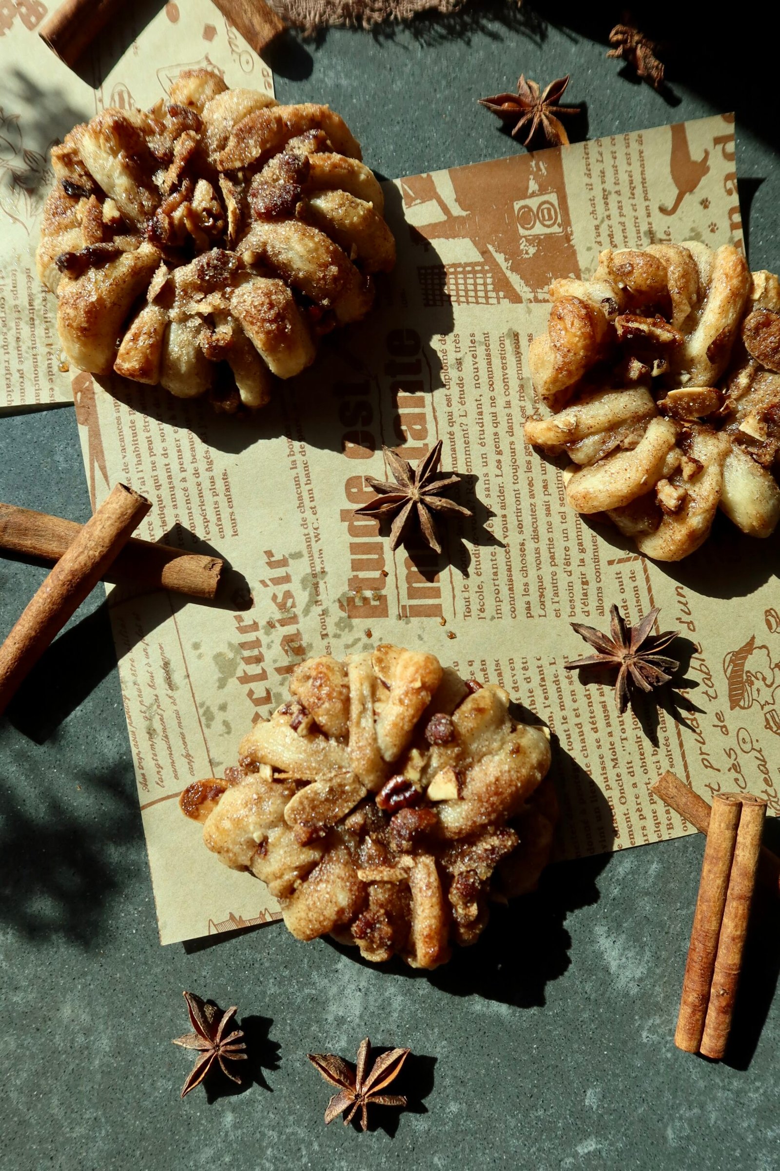 Easy puff pastry apple donuts with cinnamon apples, brown butter pecans and maple vanilla glaze