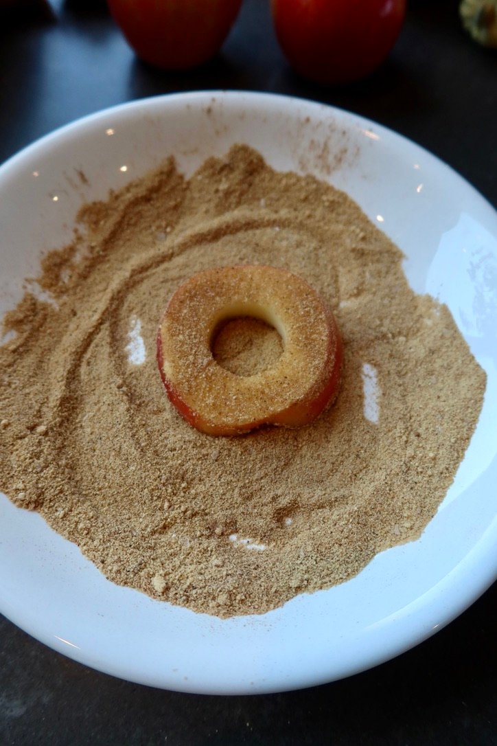 Easy puff pastry apple donuts with cinnamon apples, brown butter pecans and maple vanilla glaze