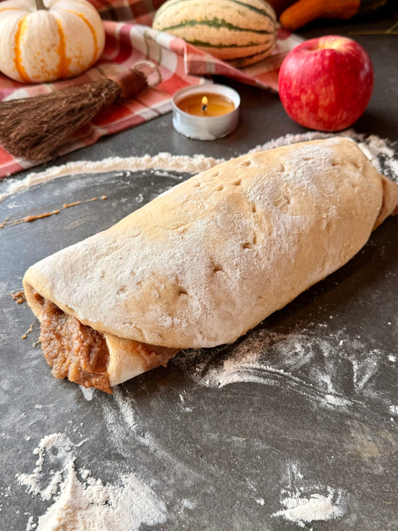 Brown butter apple pie cinnamon roll scones with apple butter filling and maple vanilla glaze